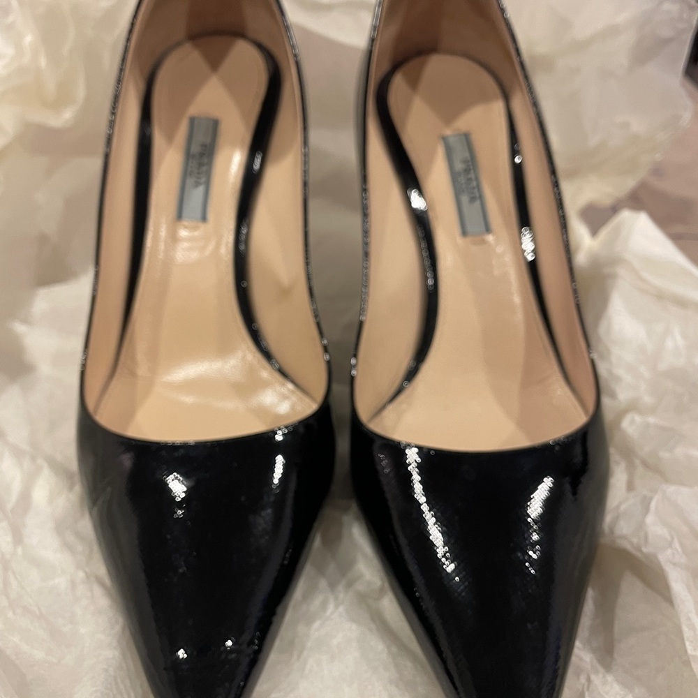 Prada size 9 pumps w a rigid like material